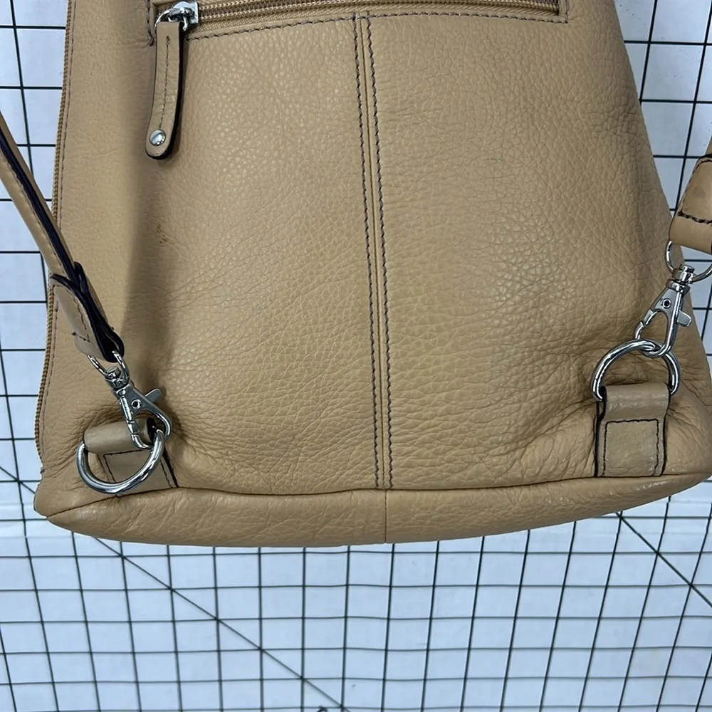 Clark’s vintage leather convertible, backpack shoulder bag.